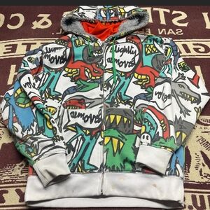 Volcom Multicolor Graffiti-Style Zip Hoodie with Orange Lined Hood